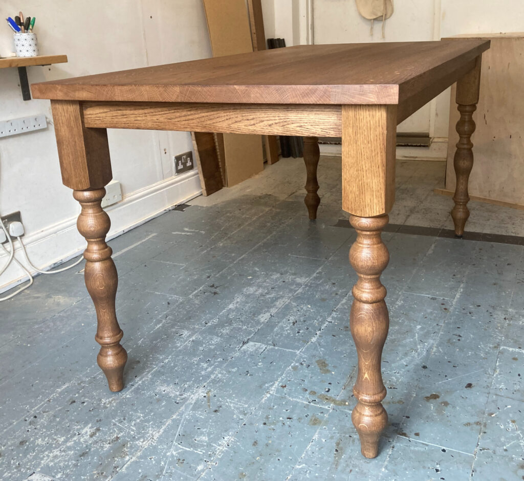 Farmhouse table with legs attached